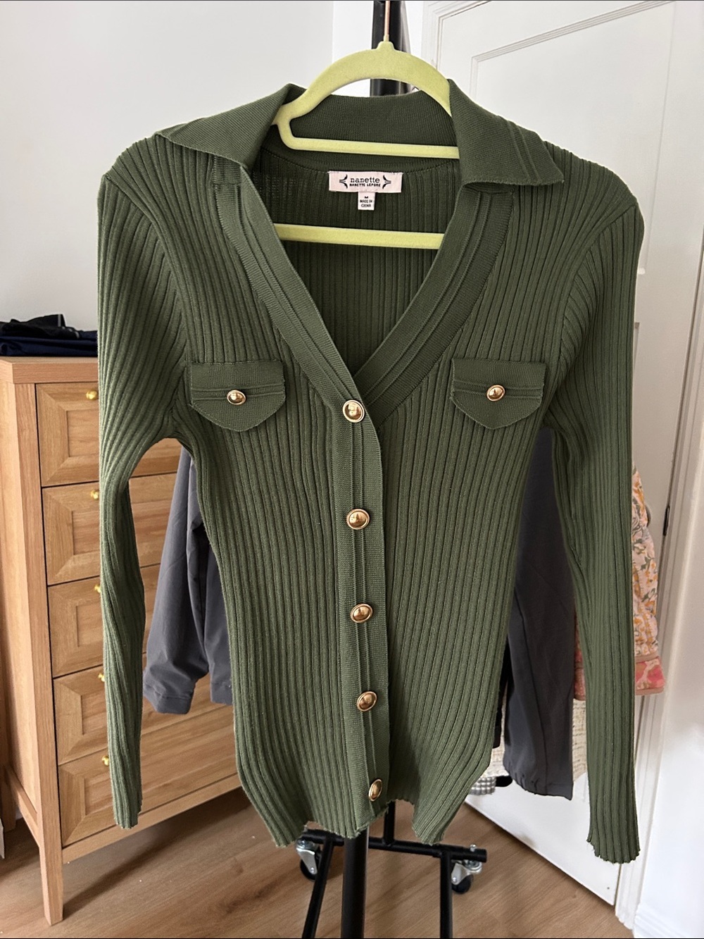 Nanette Lepore Long Sleeve. Size Medium. PTP 17”. Stretch.Non functional buttons